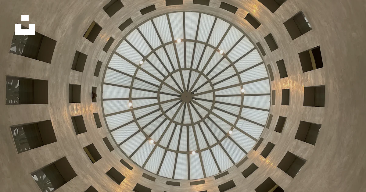 Circular Window Pattern A view of a circular window in the ceiling of a building photo – Free ...