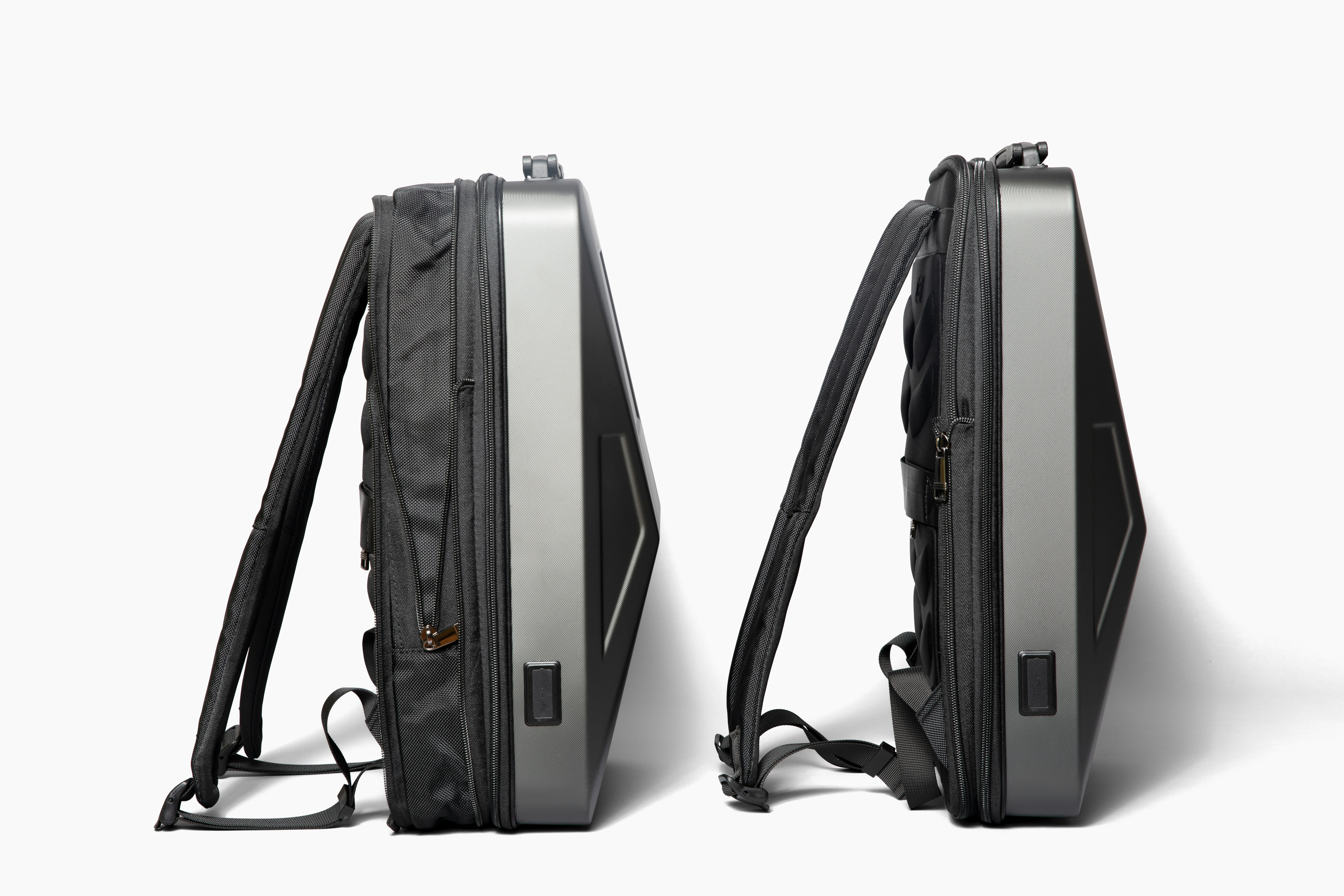 a back pack with a laptop compartment attached to it, The Cyberluggage Carryon Pro is the ultimate travel companion. Made with durable, high-quality materials, this luggage suitcase is built to withstand even the toughest of trips. Its compact design makes it perfect for carry-on use, while still providing ample storage space for all your travel essentials. With multiple pockets and compartments, you can easily organize and access your belongings. And with its smooth-rolling wheels and telescoping handle, maneuvering through the airport has never been easier. Travel in style and with peace of mind with the Cyberluggage Carryon Pro.