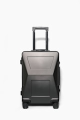 A sleek navy blue suitcase with expandable compartments and clearly visible wet and dry separation sections.