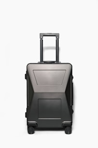 A sleek navy blue suitcase with expandable compartments and clearly visible wet and dry separation sections.