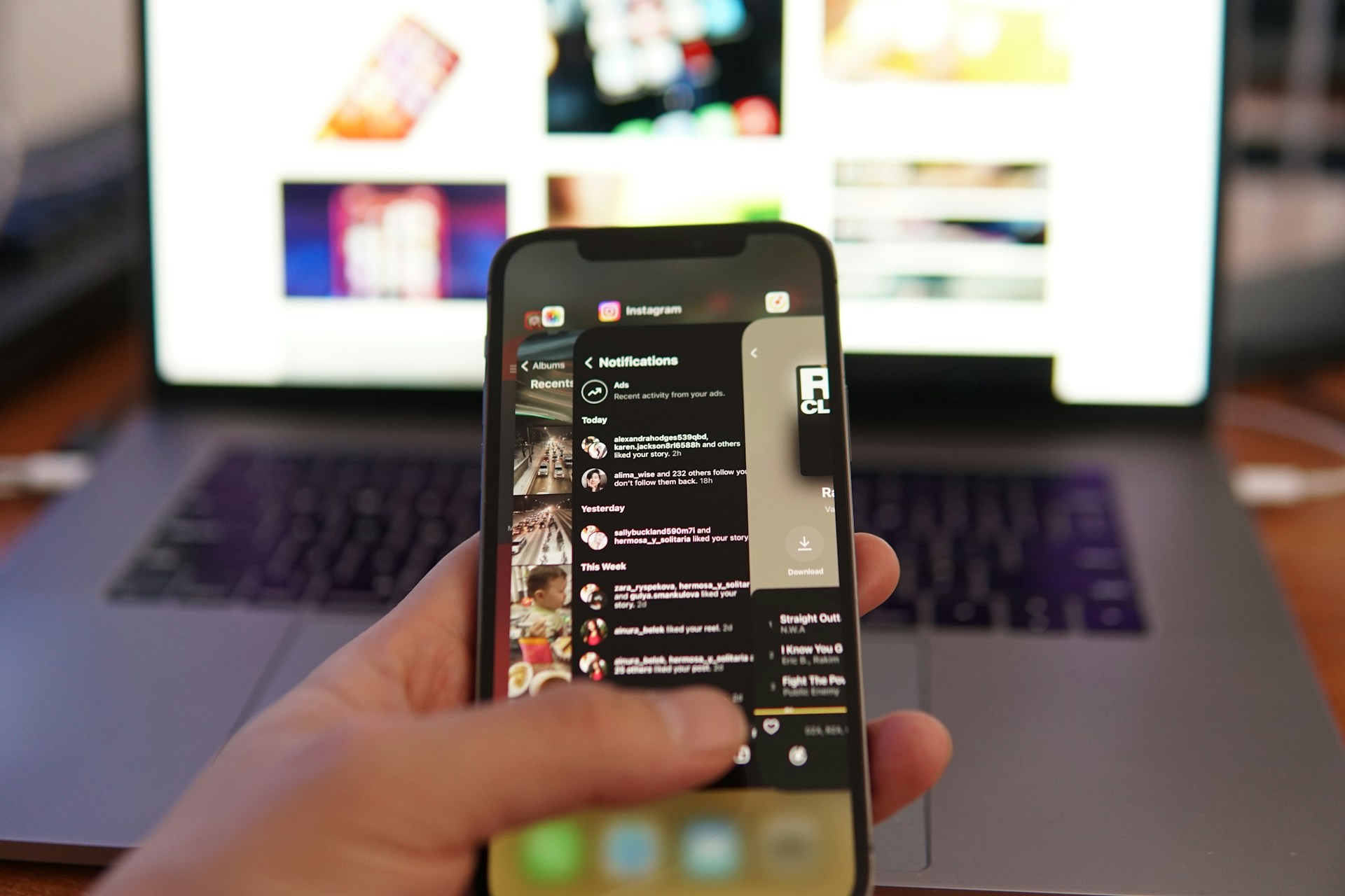 Close-up of a smartphone showing notifications of recent affiliate commissions from multiple platforms.