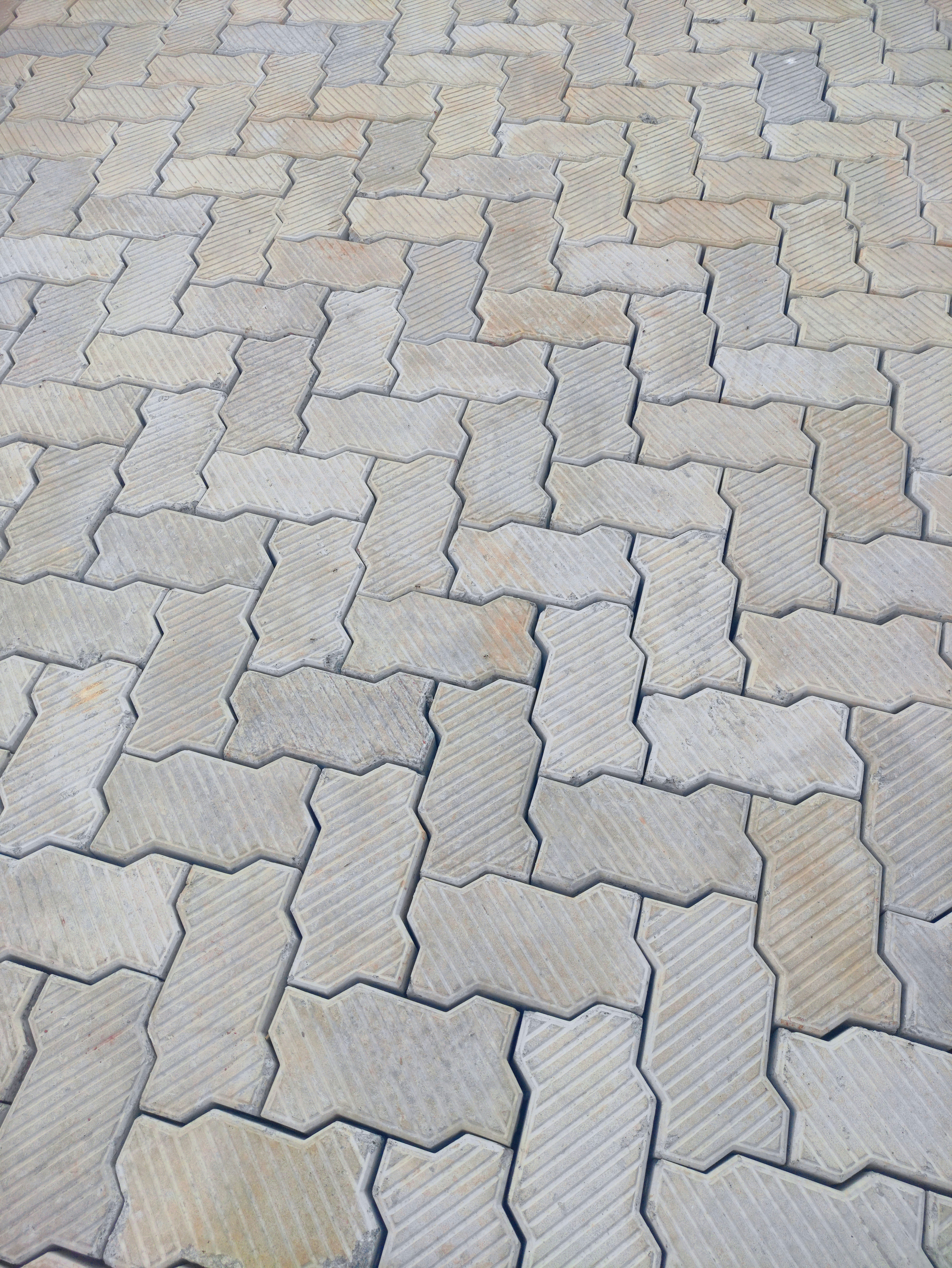 Interlocking concrete cabro pavers installed on a residential driveway