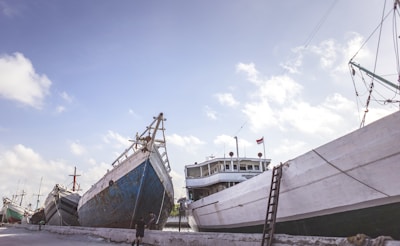 a couple of large boats sitting next to each other