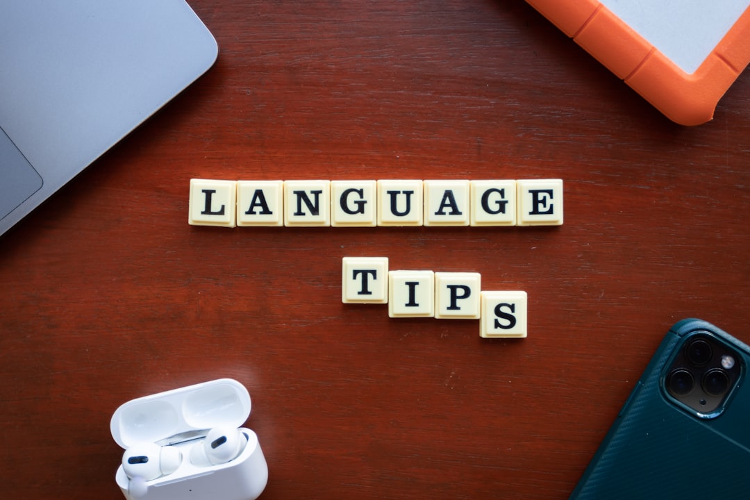 the word language tips spelled with scrabble tiles, Language Tips Words