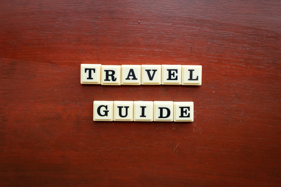 the word travel guide spelled with scrabble tiles, Travel Guide Words