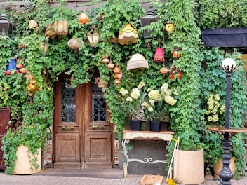 A welcoming entrance to a charming Varanasi guesthouse with traditional lanterns.
