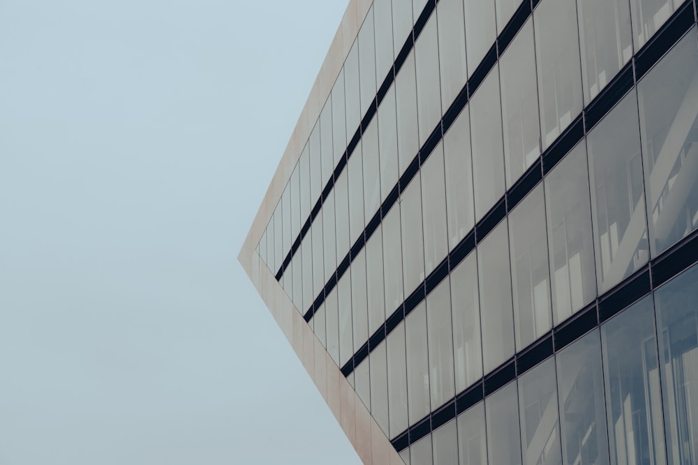 a very tall building next to a very tall building