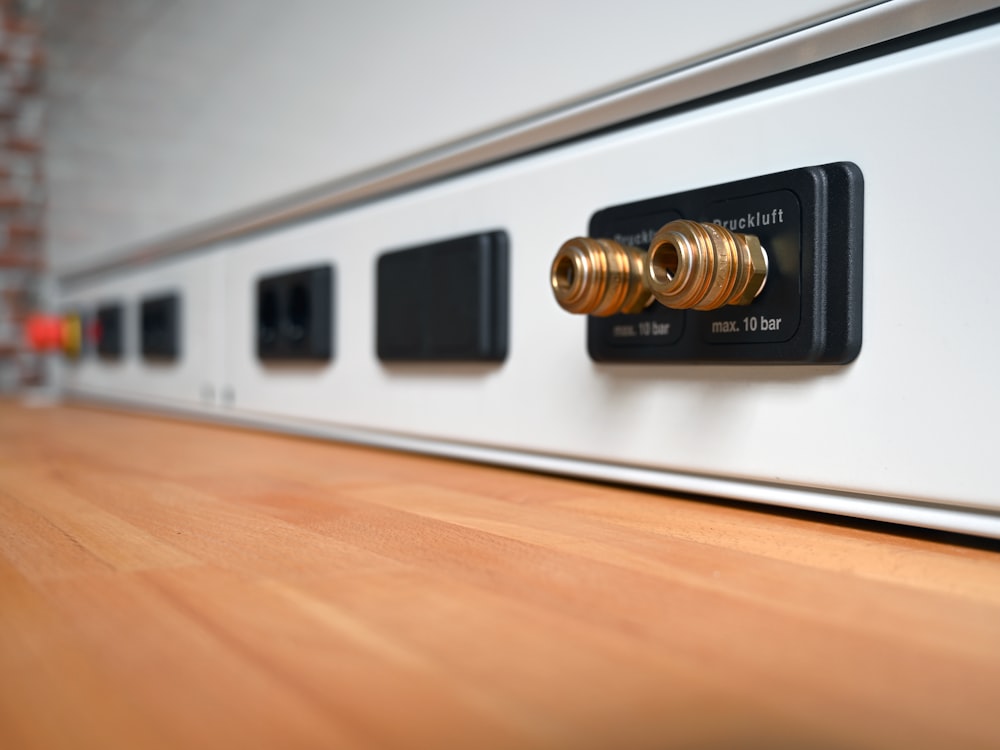 a close up of a metal and wood cabinet