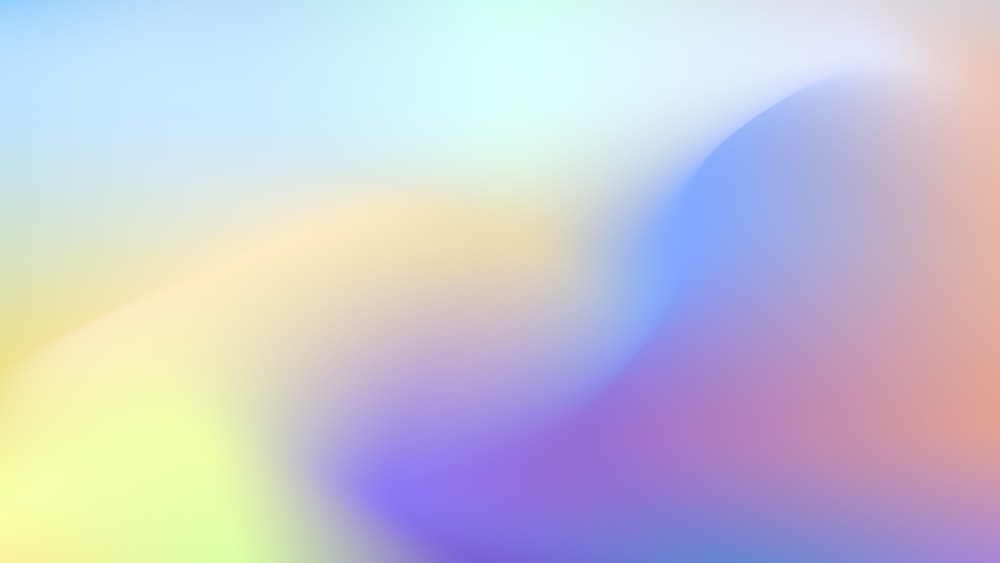 a blurry image of a blue and yellow background