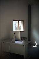 A sleek workspace with minimalist design and natural light.