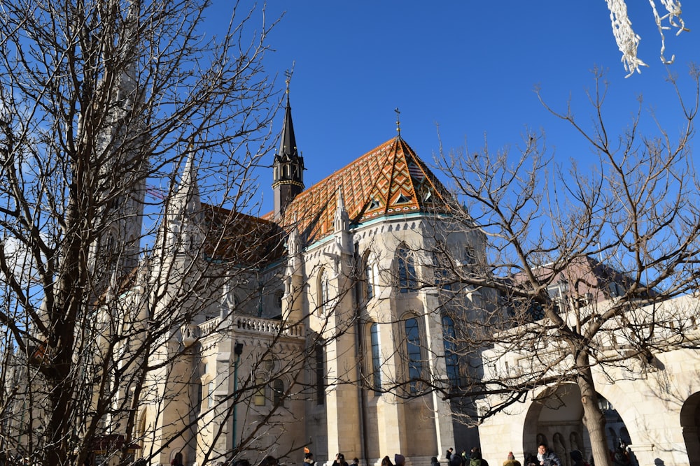 a large church with a tall steeple and a clock tower