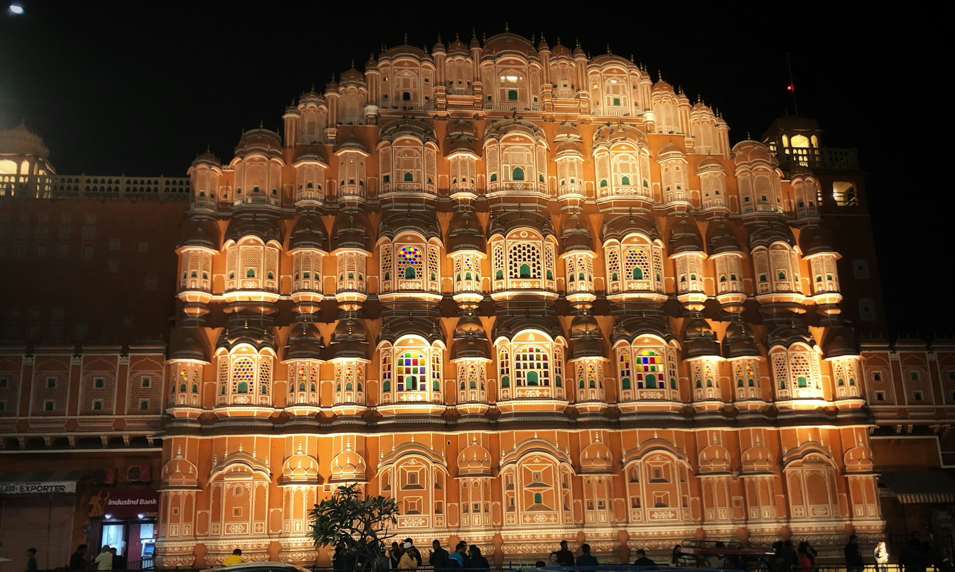 woman wearing yellow long-sleeved dress under white clouds and blue sky during daytime