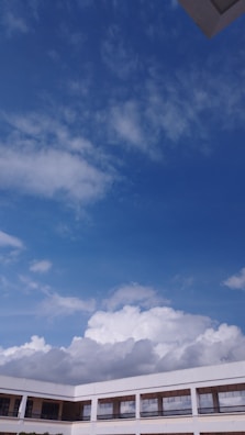 Cloud data center exterior with blue sky background.