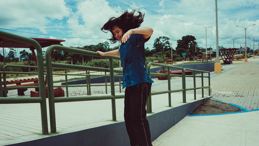 a person riding a skate board on a rail