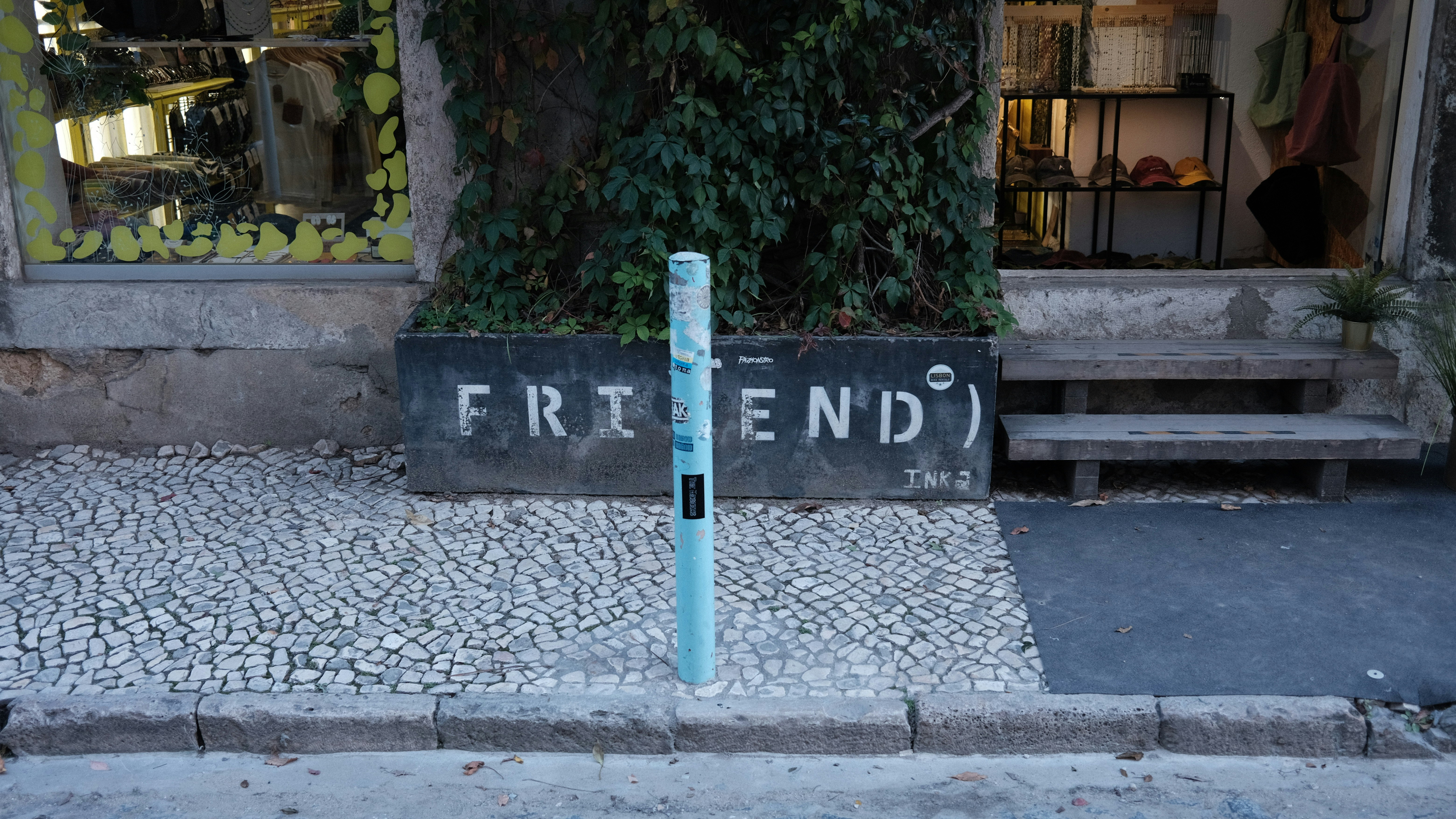 a street sign sitting on the side of a road