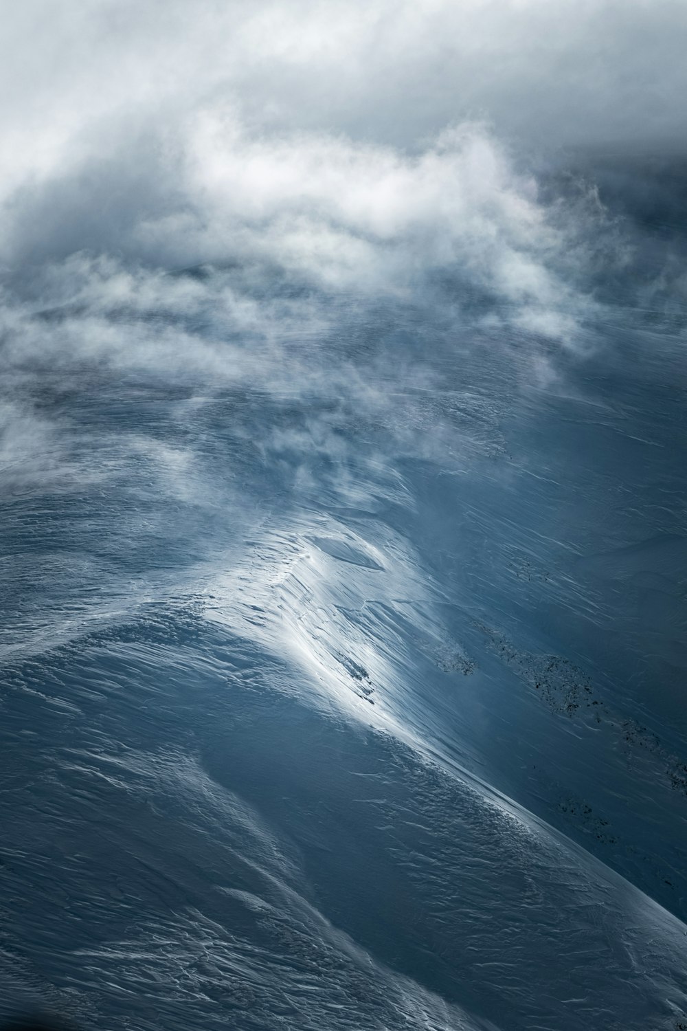 a very large wave in the middle of the ocean