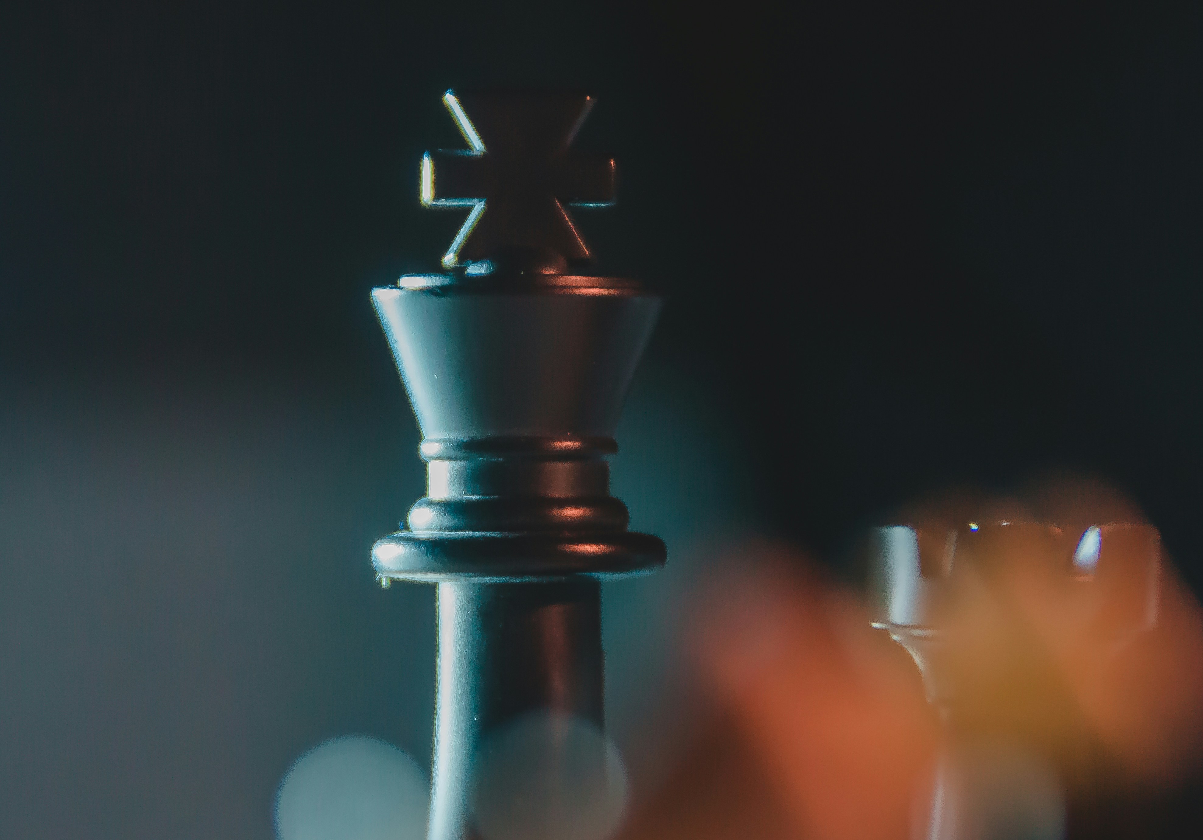 a close up of a chess piece on a chess board