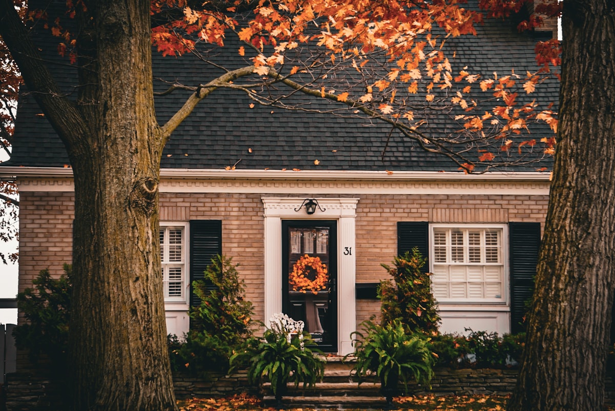 A house with a wreath on the front door
