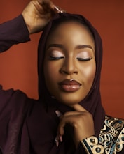 a woman wearing a hijab and a head scarf