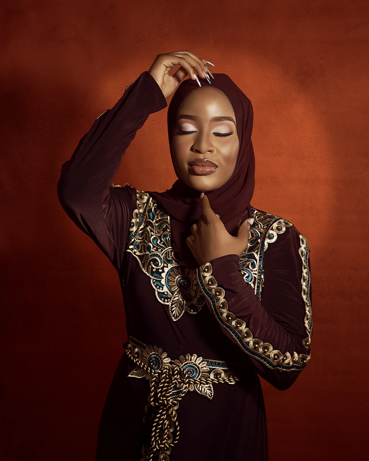 Marrakech Rose — plum silk hijab on terracotta