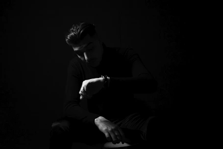 A sleek, modern patch applied discreetly on a wrist under dim party lighting.