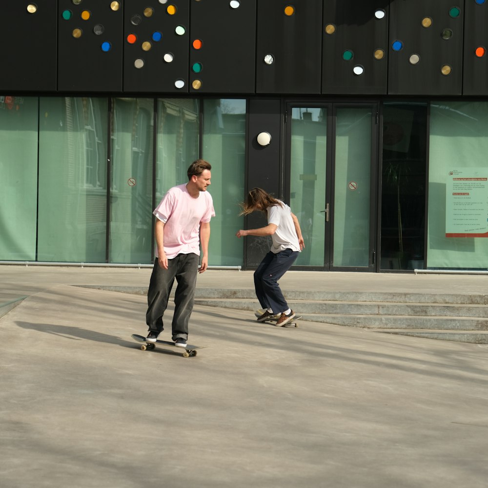 a couple of people that are on skateboards