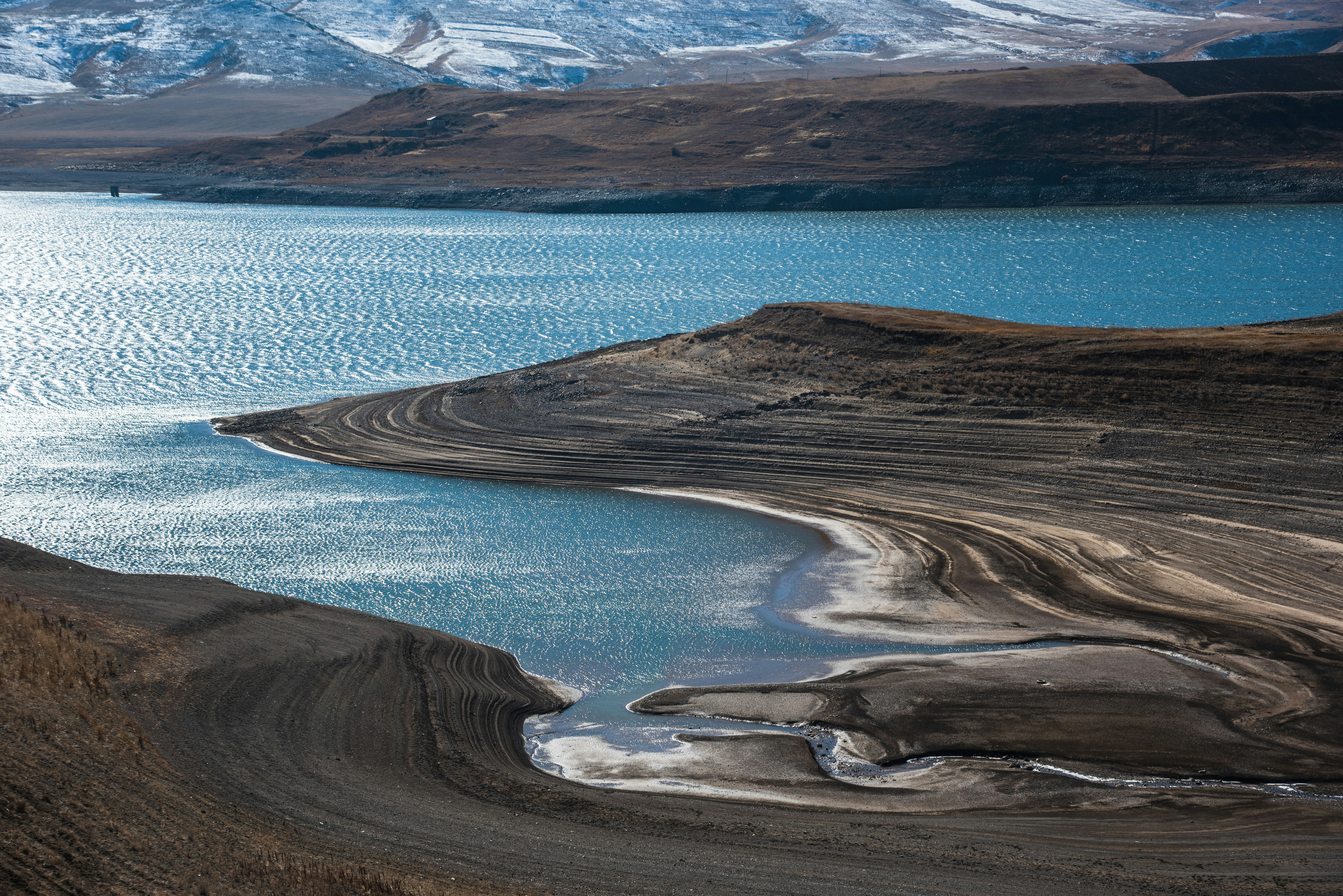 a large body of water surrounded by mountains