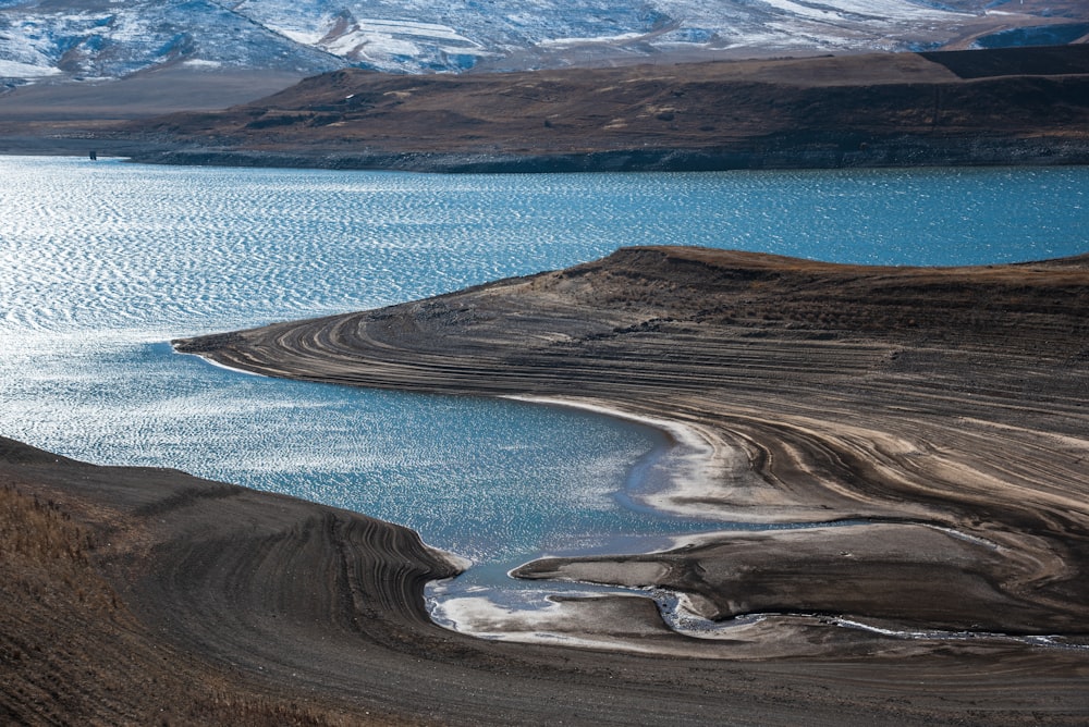 a large body of water surrounded by mountains