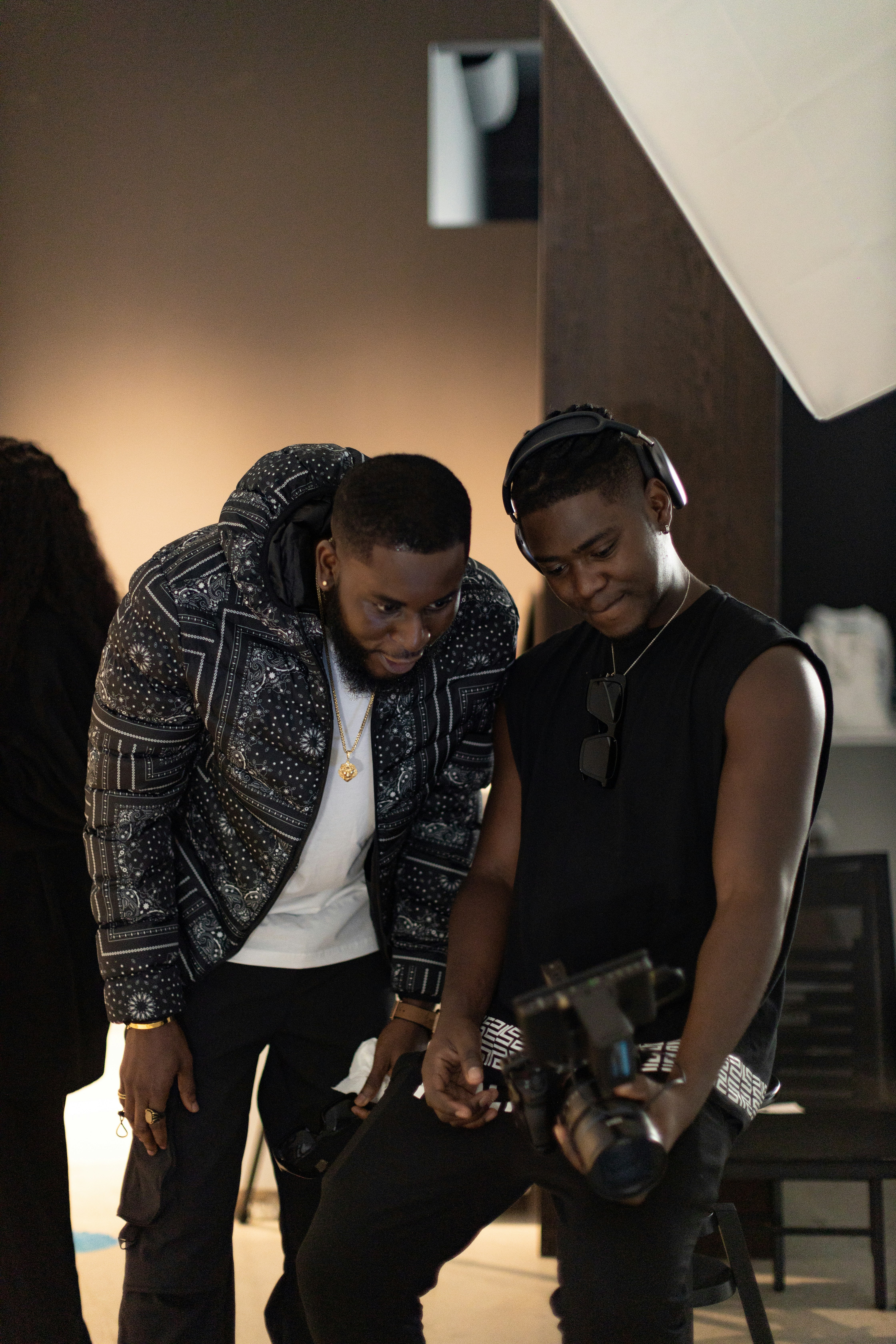 a couple of men standing next to each other