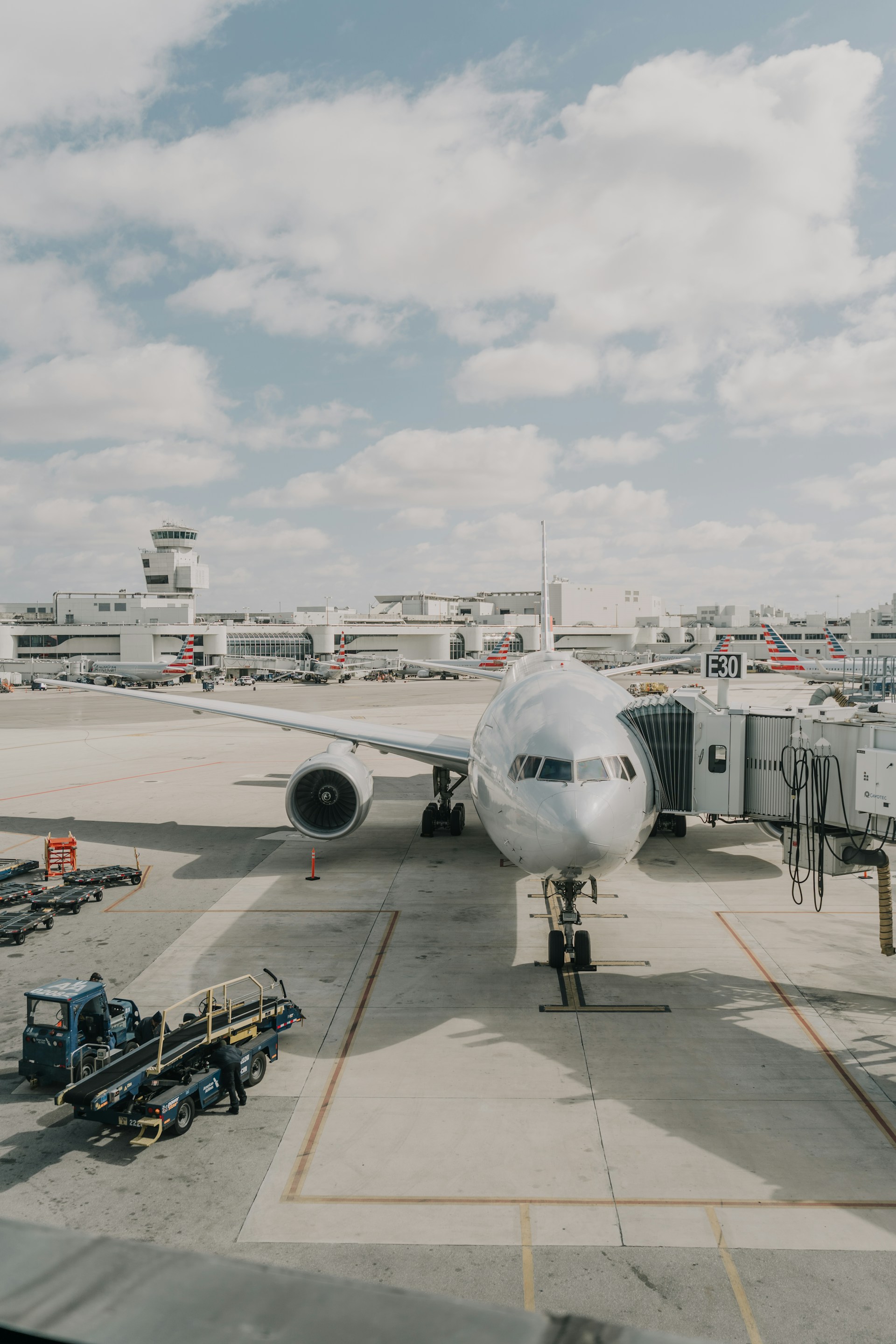 a large jetliner sitting on top of an airport tarmac