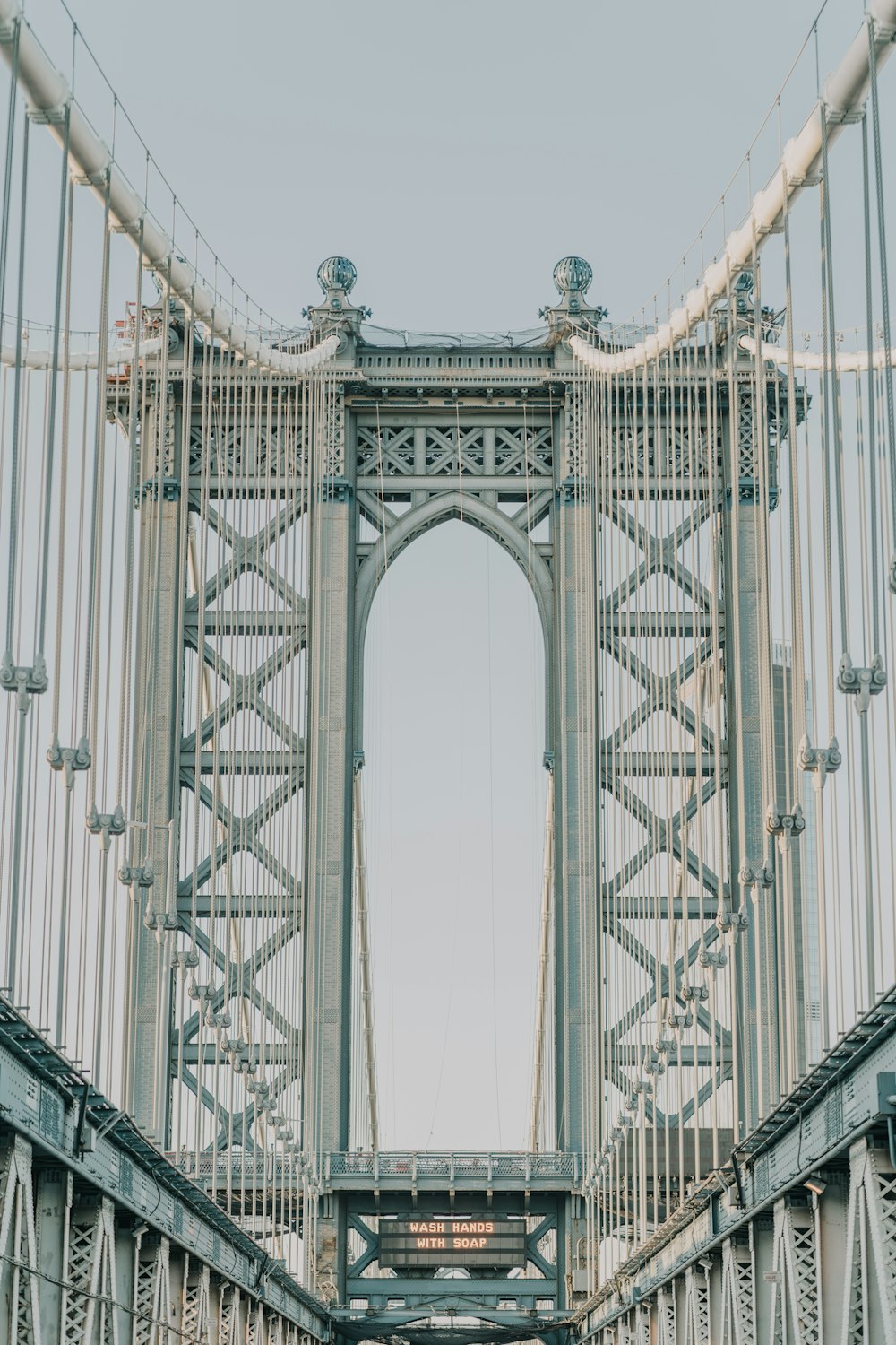 a view of a bridge from the ground