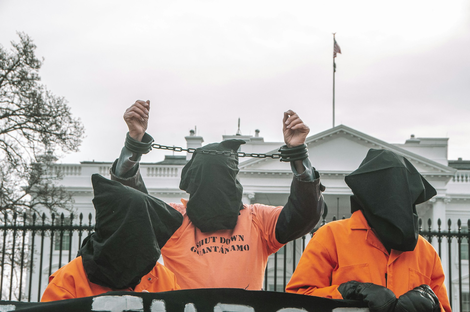 woman wearing yellow long-sleeved dress under white clouds and blue sky during daytime
