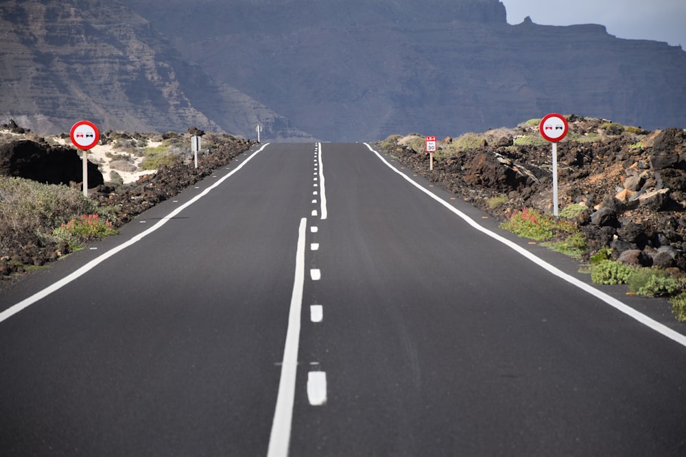 a long empty road with no cars on it