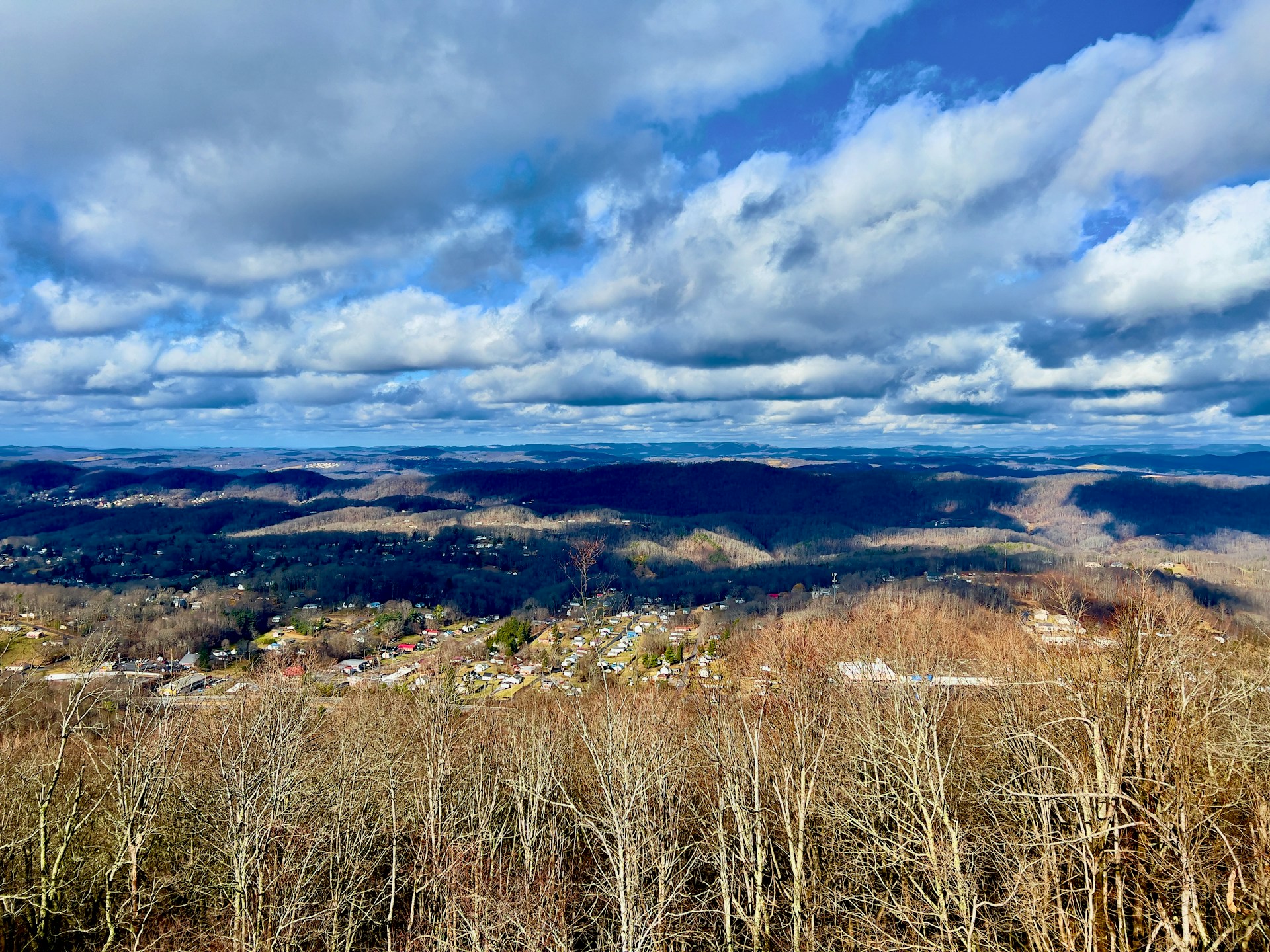 a scenic view of a city in the distance