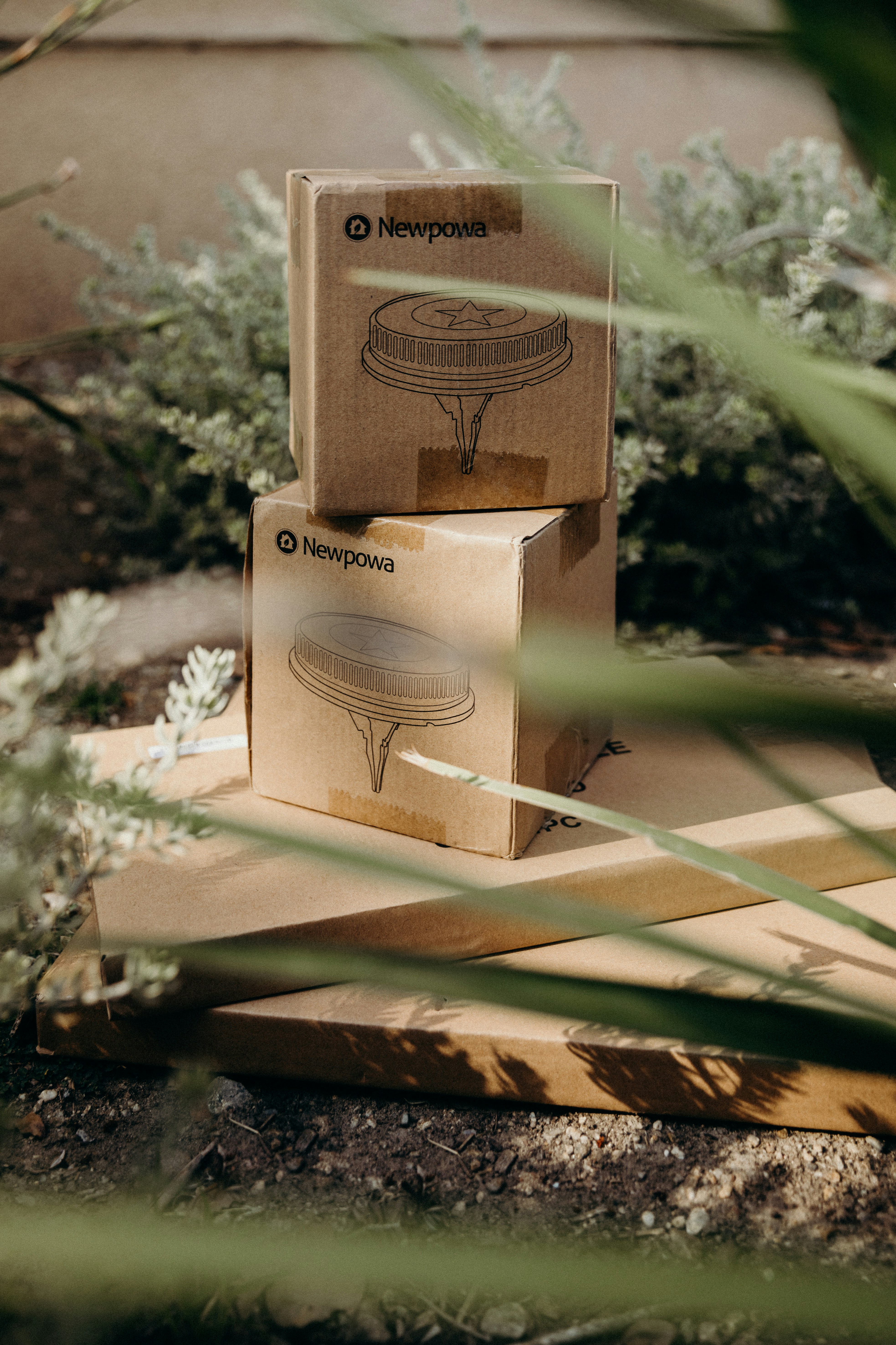 Custom printed mailer boxes stacked, showing branded exterior