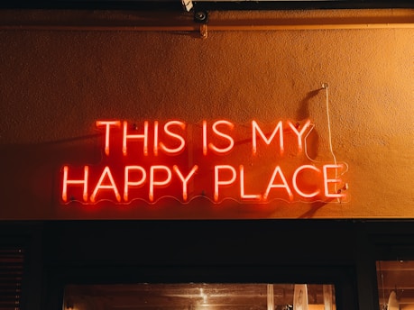 a neon sign that says, this is my happy place