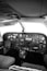 a black and white photo of the cockpit of a plane