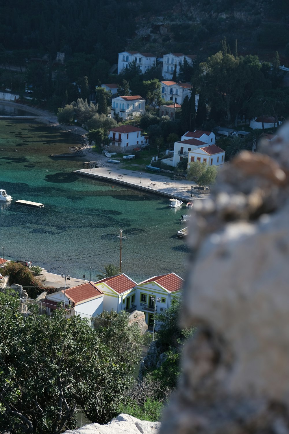 a view of a small town and a body of water