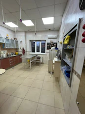 A sparkle-clean kitchen with shining countertops and spotless appliances.
