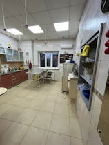 A well-equipped kitchen area with modern appliances and ample space.