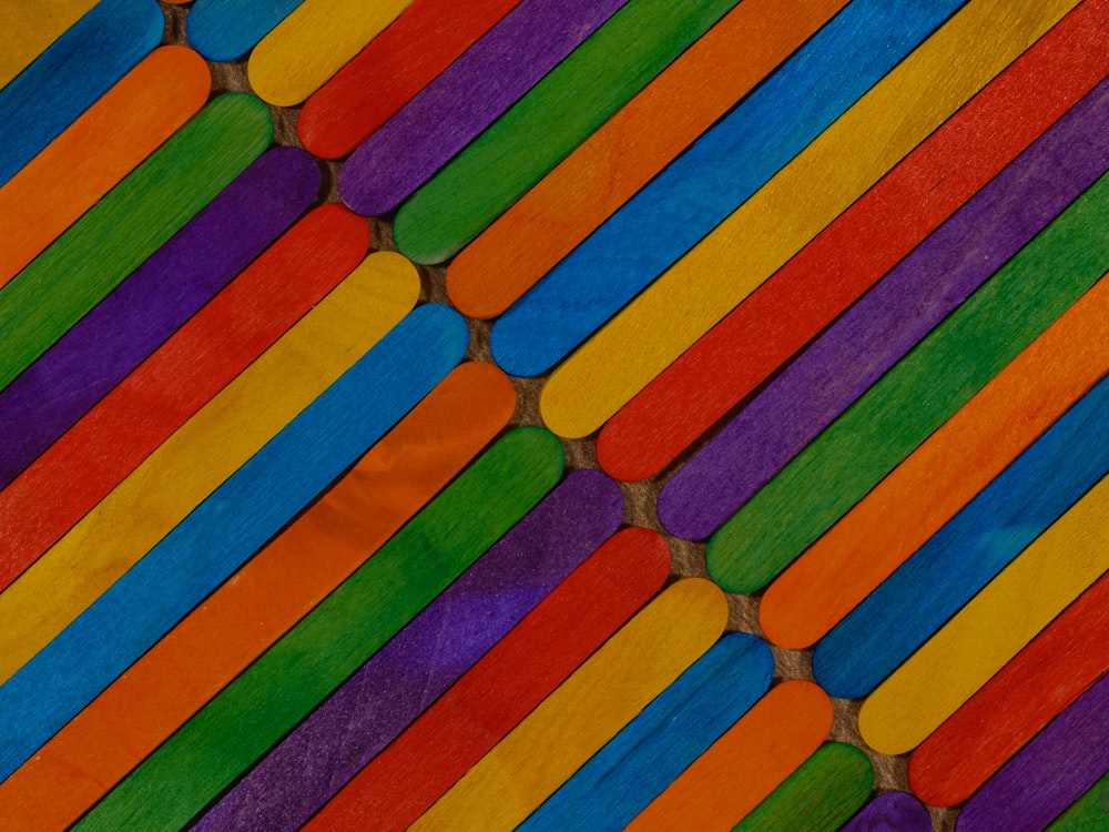 a close up of a multicolored wooden surface