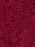 a close up of a red area rug
