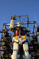 A surreal scene of a giant robot gently holding a tiny human under a starry sky.