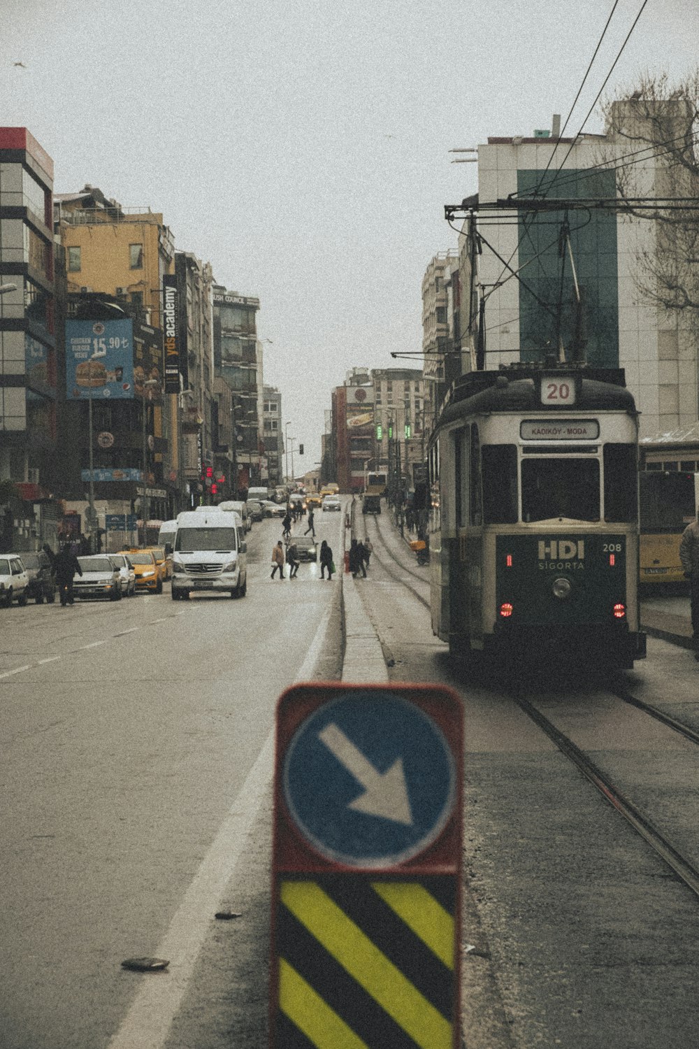 a train on a train track in a city