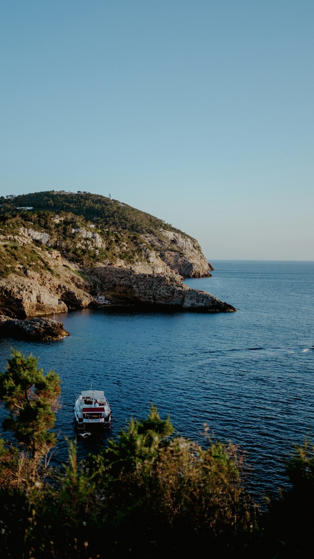 a boat floating on top of a body of water