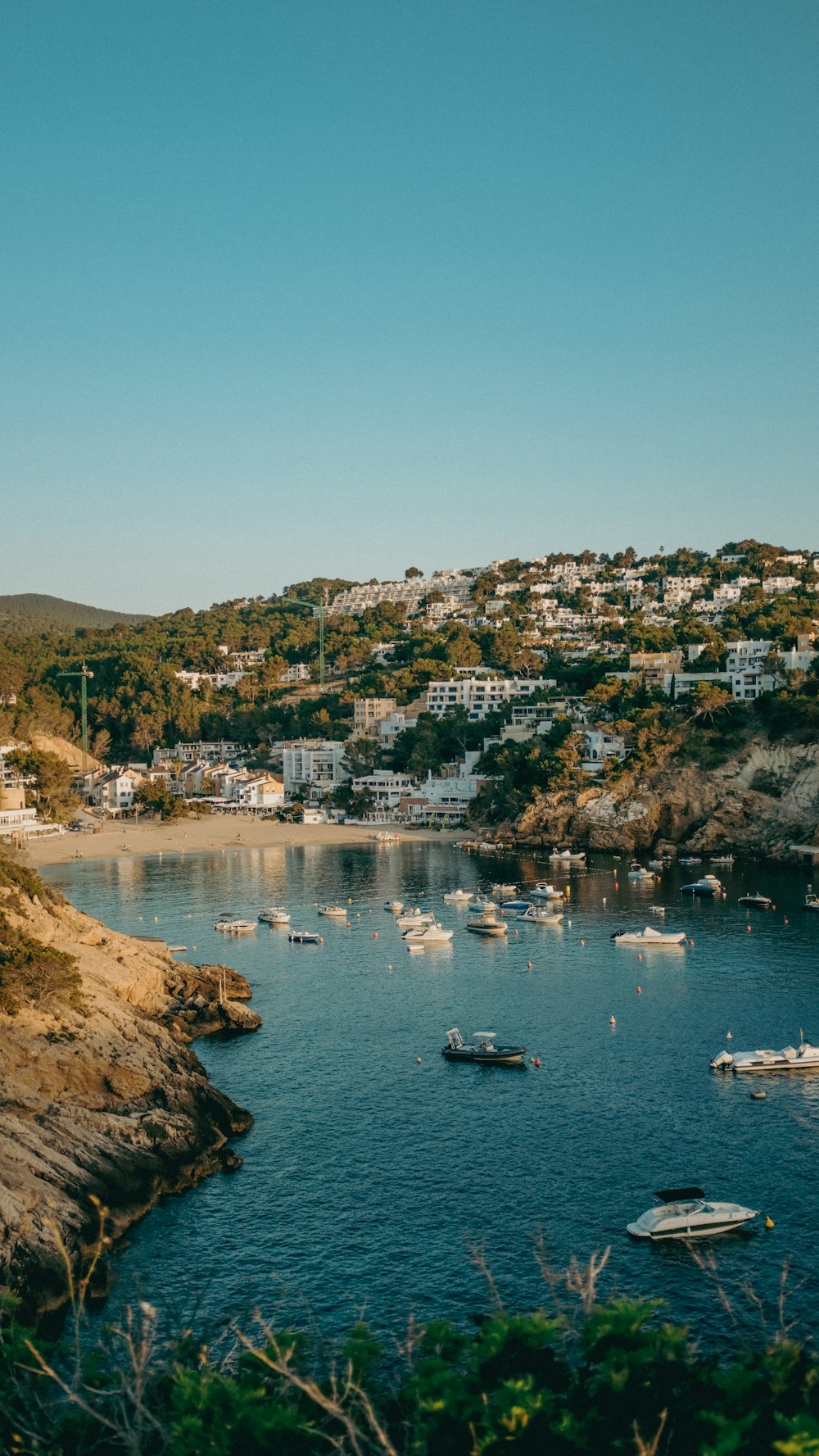 a body of water with boats floating on it