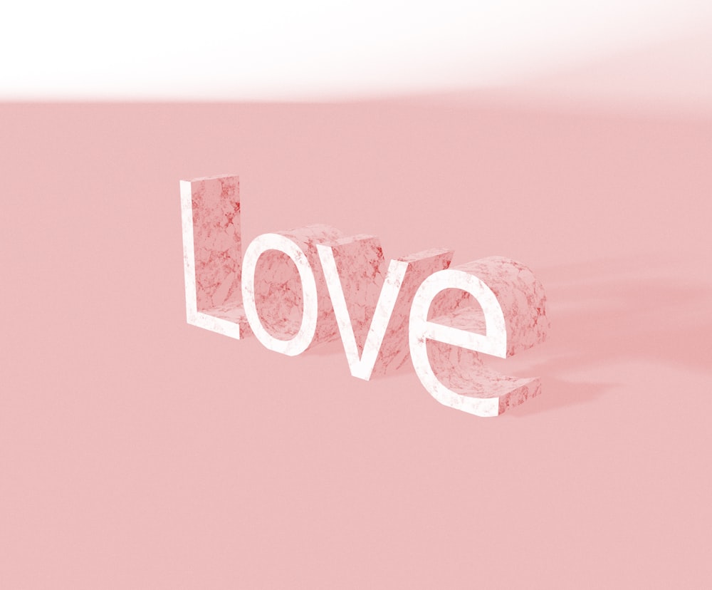 a pink background with the word love spelled out