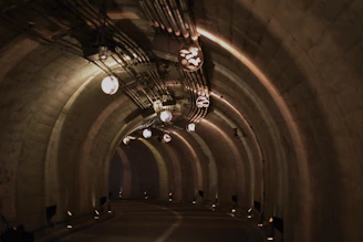 a long tunnel with lights on both sides of it