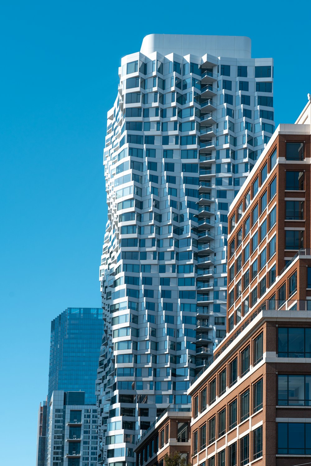 a tall building with a lot of windows in front of it