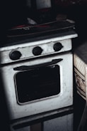 A before and after image of a repaired oven.